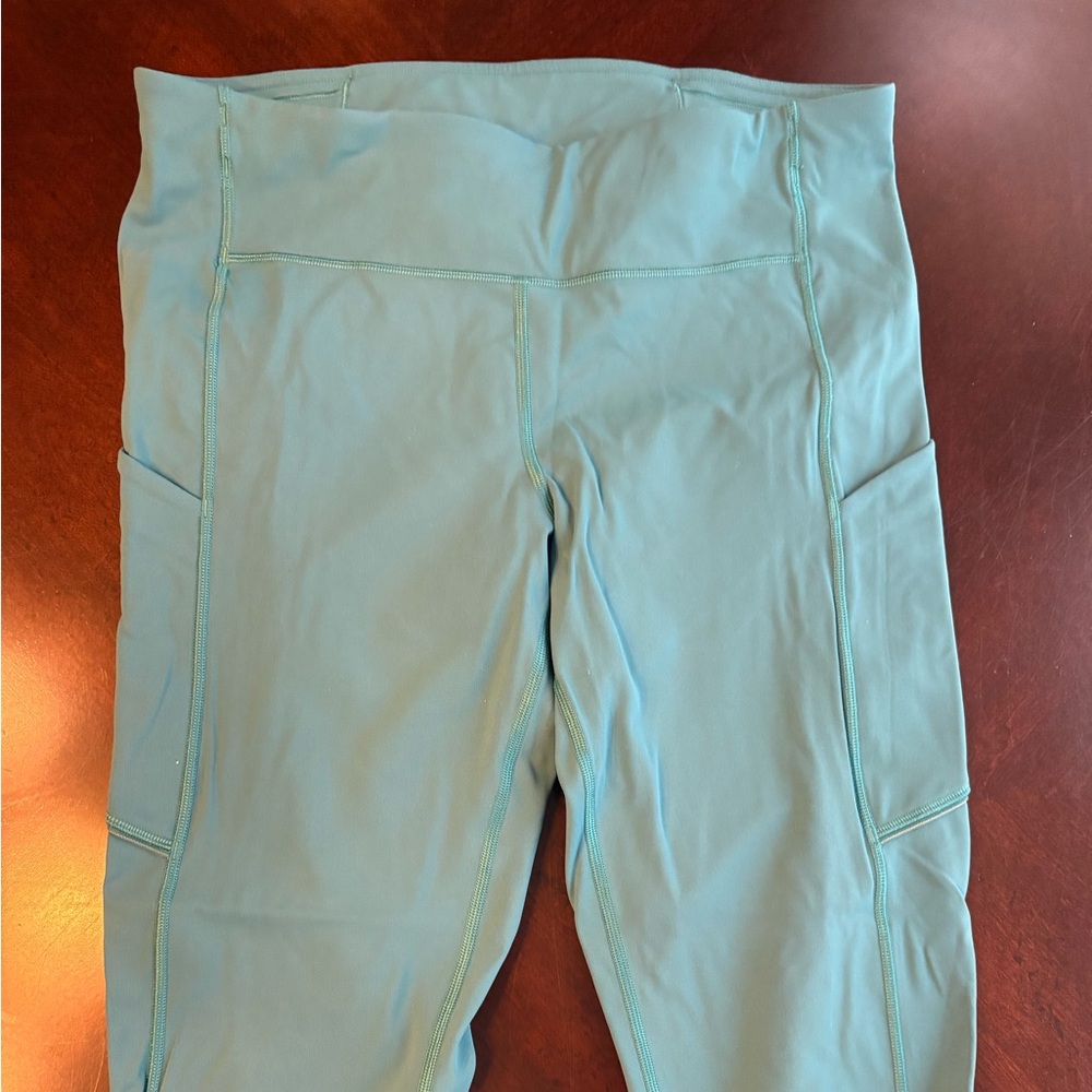 Lululemon size 8 women's teal leggings swift speed full length.